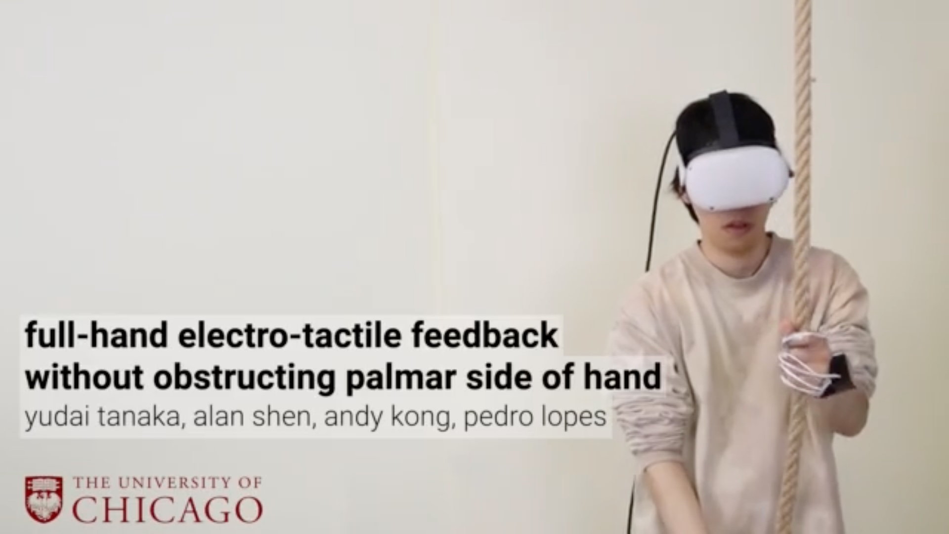 Paper title card: person in a VR headset grips a rope, for full-hand electro-tactile feedback research at UChicago