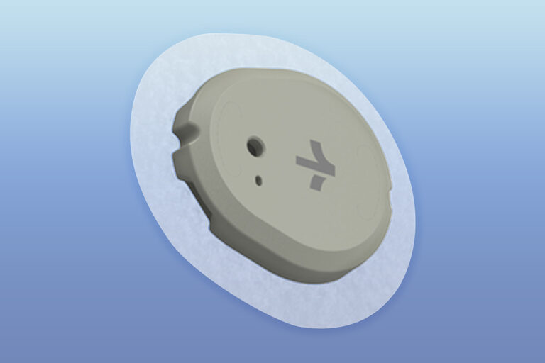 Render of the Dexcom Stelo CGM, a small gray oval sensor on a white adhesive patch