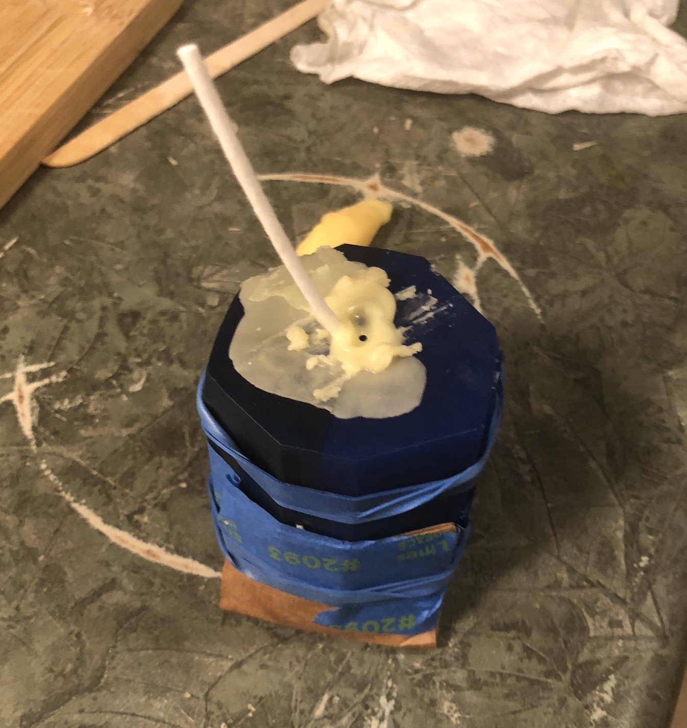 After pouring, the candle looks like this. The white bit is the wick.