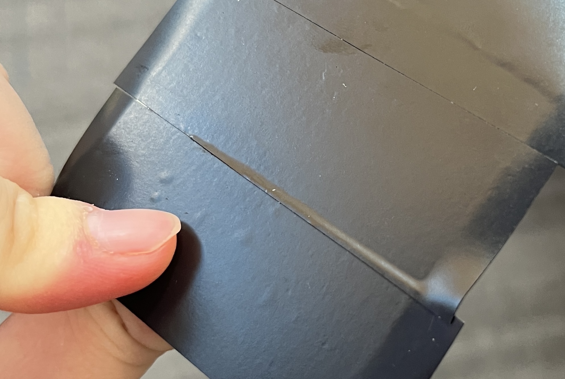 Overlapping tape backing