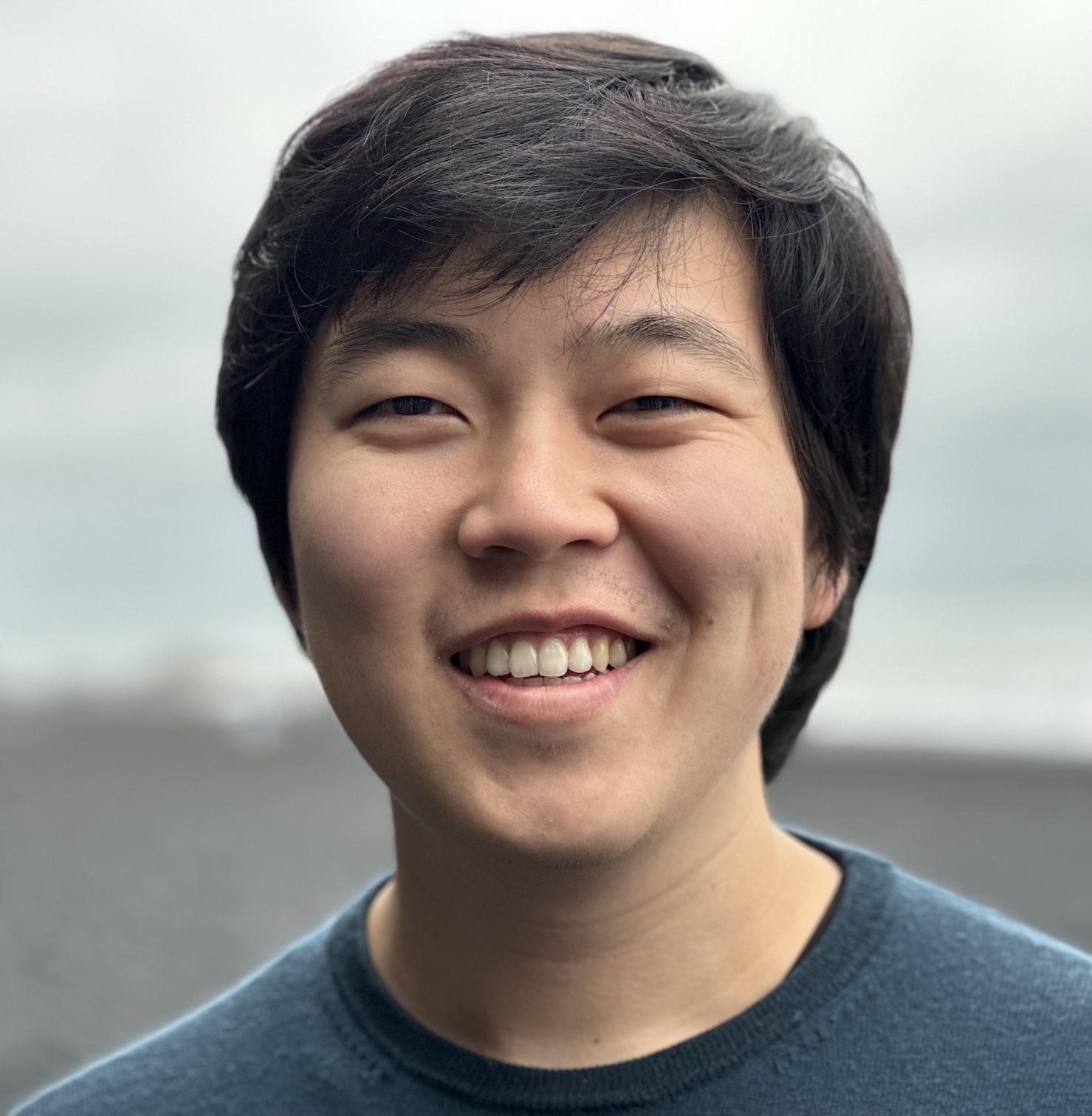 Photo of Andy Kong (website author) smiling
