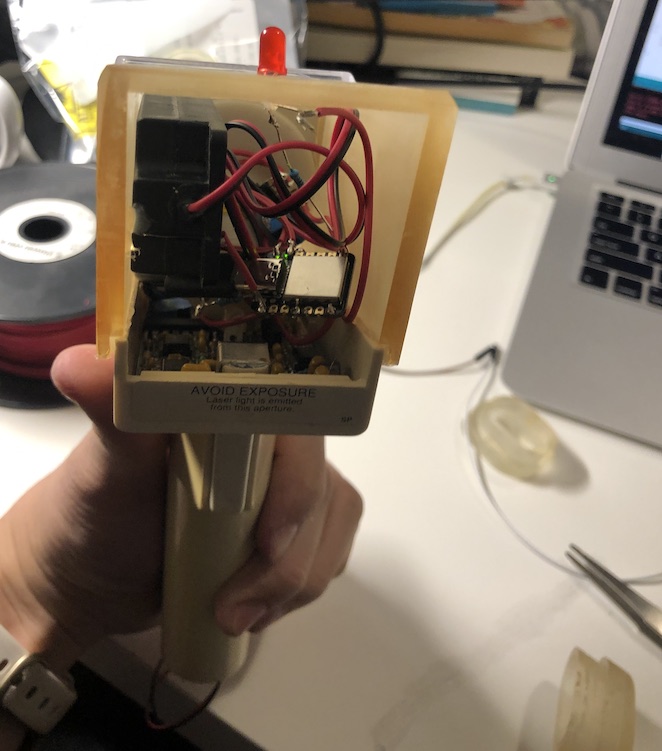 Open Meiger Counter revealing its internal circuit board, red wiring, and indicator LED