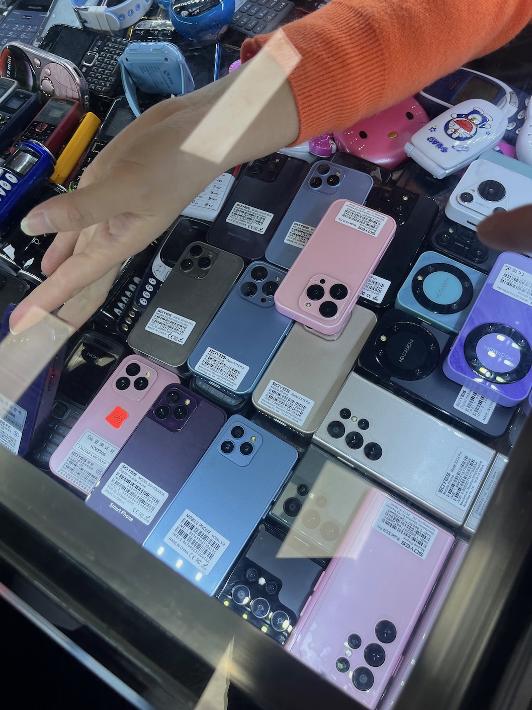Funny phones from a HQB stall. All were very functional, and I suspect they're actually made to be used by children
