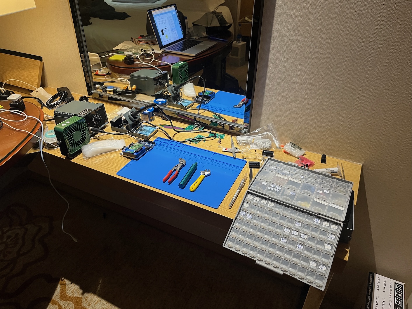 My workspace, aka my hotel room. Funny that they let you solder, but it's not so surprising when you consider they let you smoke too