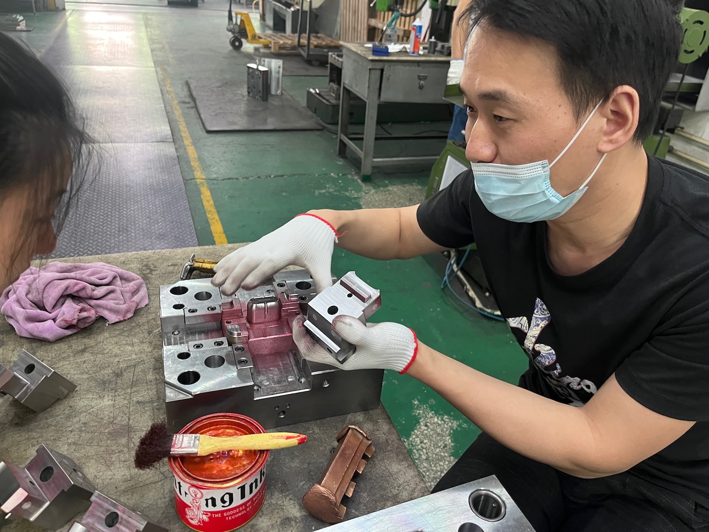 Expert shows us how they check and fix for little imperfections in the mold